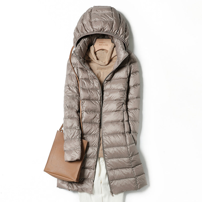 A mid-length, lightweight down jacket for women