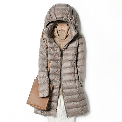 A mid-length, lightweight down jacket for women