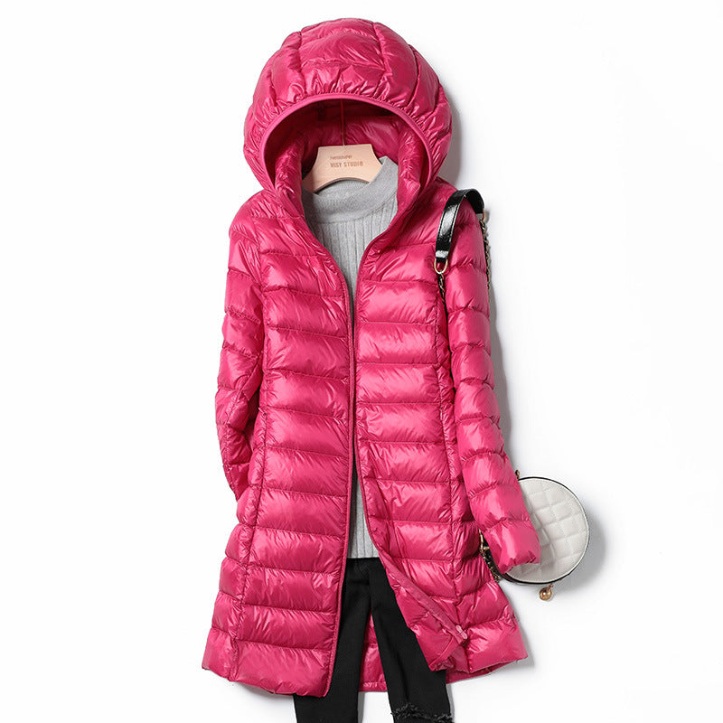 A mid-length, lightweight down jacket for women