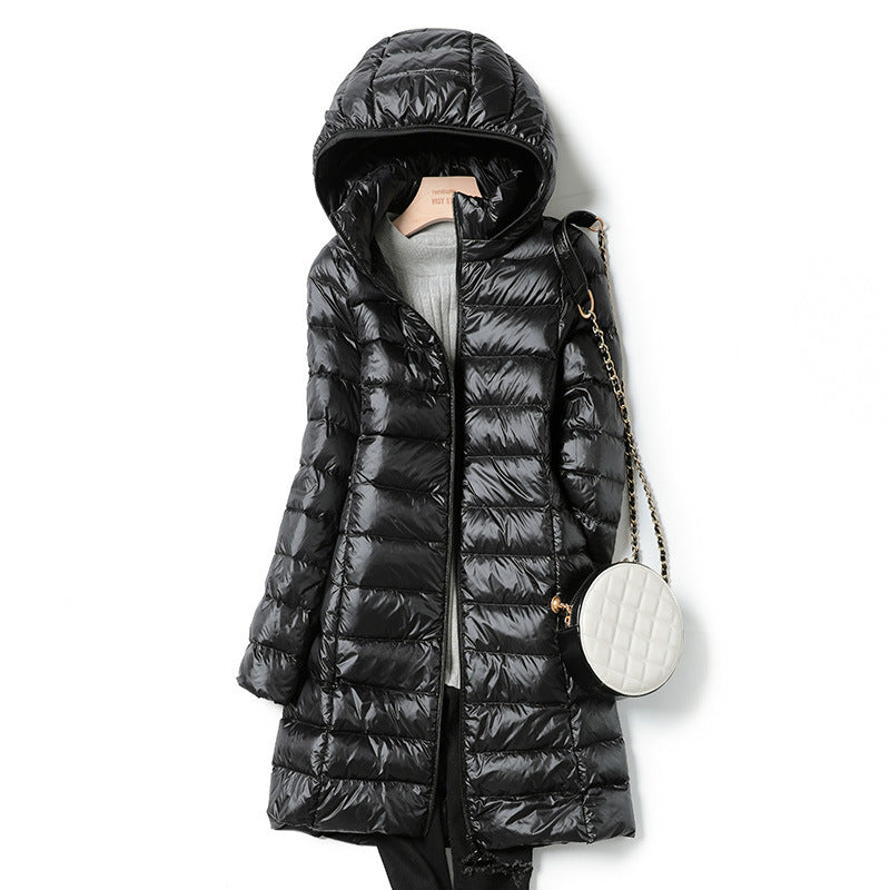 A mid-length, lightweight down jacket for women