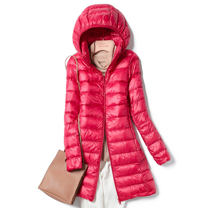 A mid-length, lightweight down jacket for women