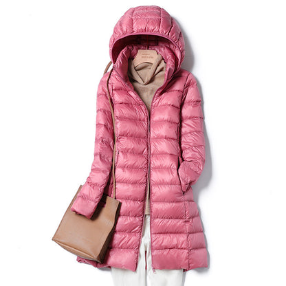 A mid-length, lightweight down jacket for women