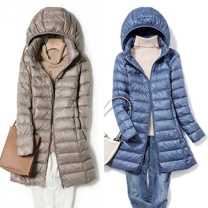 A mid-length, lightweight down jacket for women