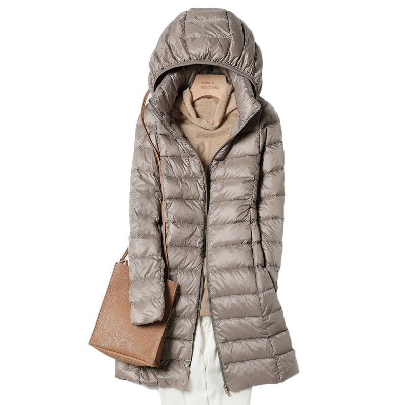 A mid-length, lightweight down jacket for women